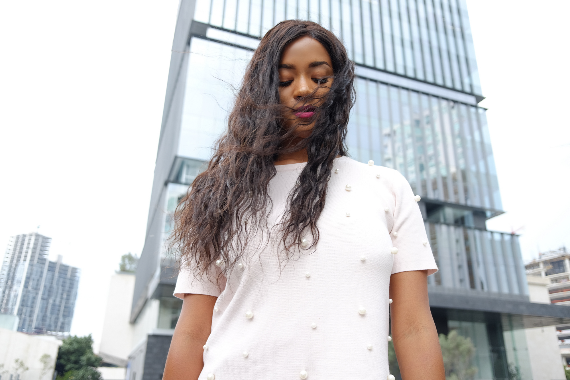 New York Fashion Blogger MeetMiri wearing a beaded top 