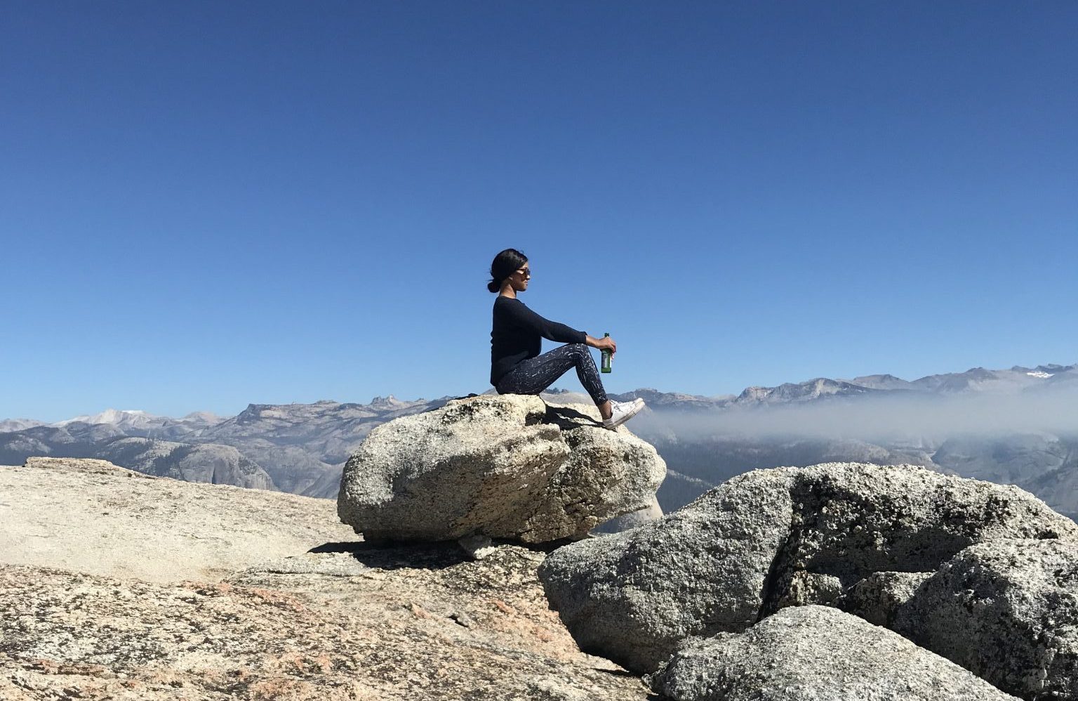 me sitting on a rock, in the Yosemite national park