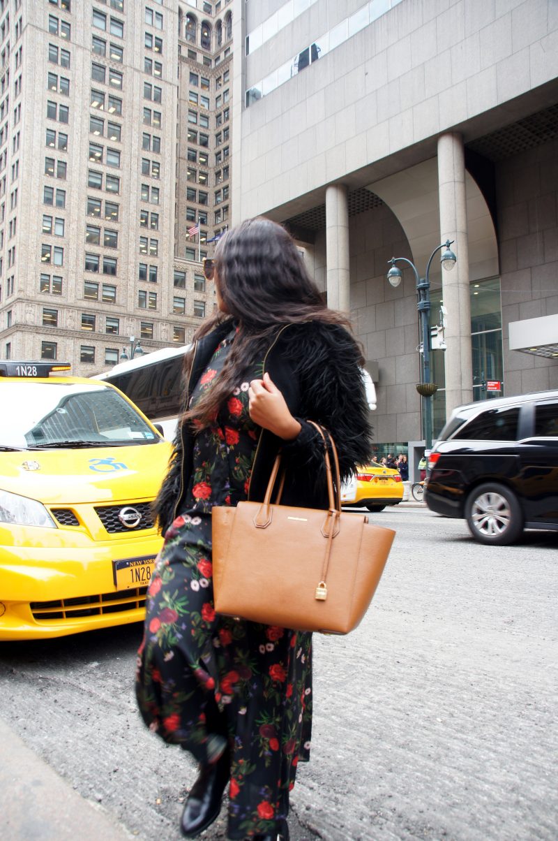 Me wearing a floral maxi dress outside the Grand Central Station in New York