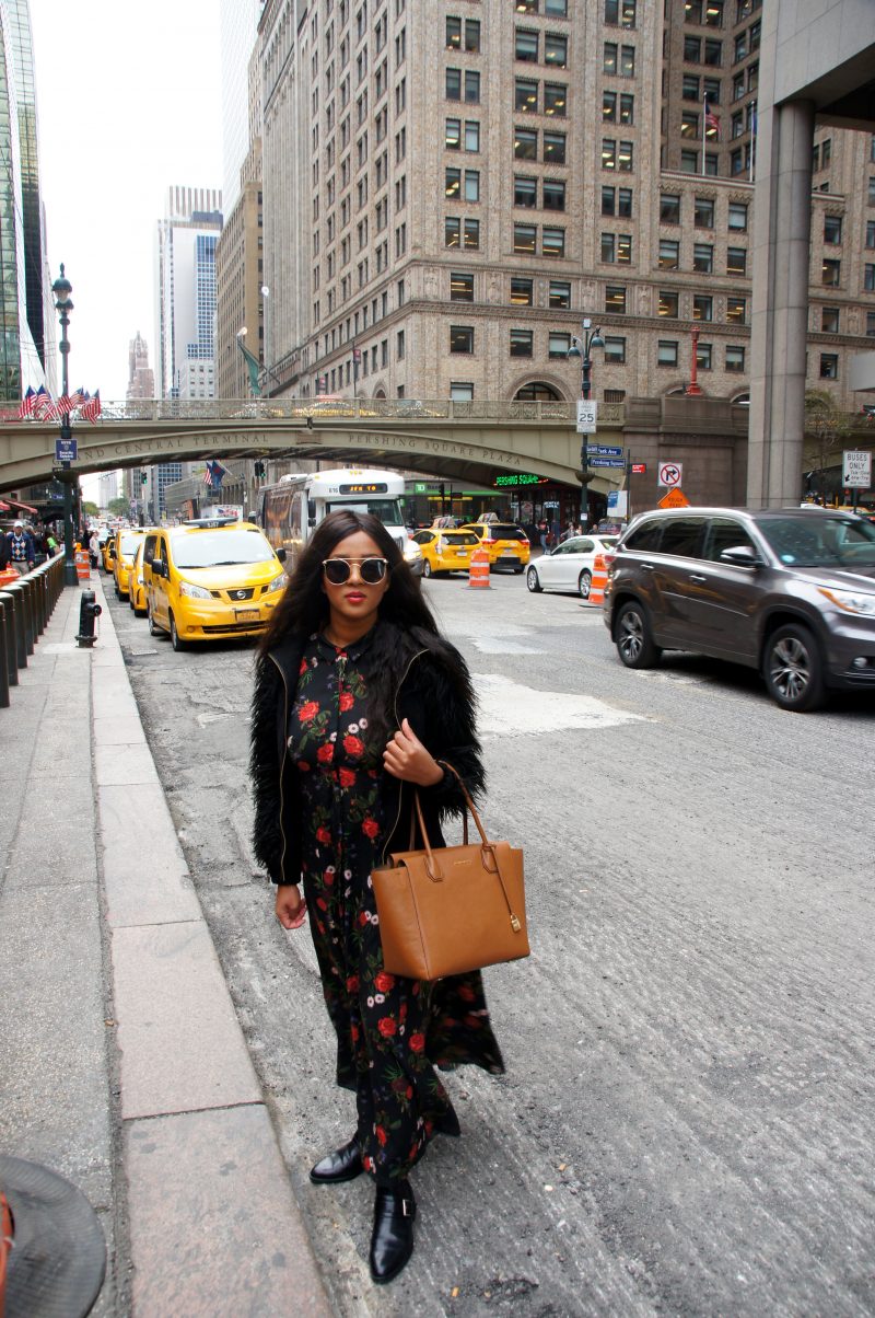 Me wearing a floral maxi dress outside the Grand Central Station in New York