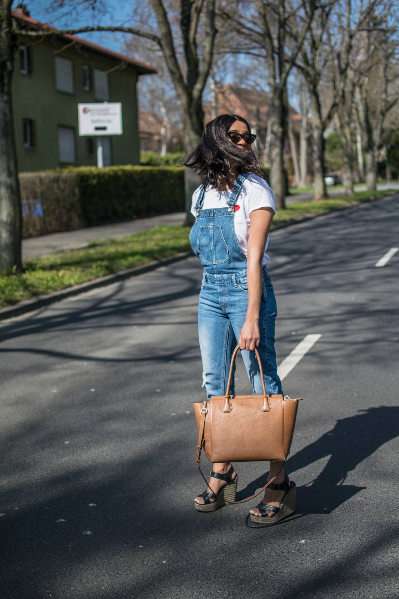 Ways to give back to the community girl in dungarees