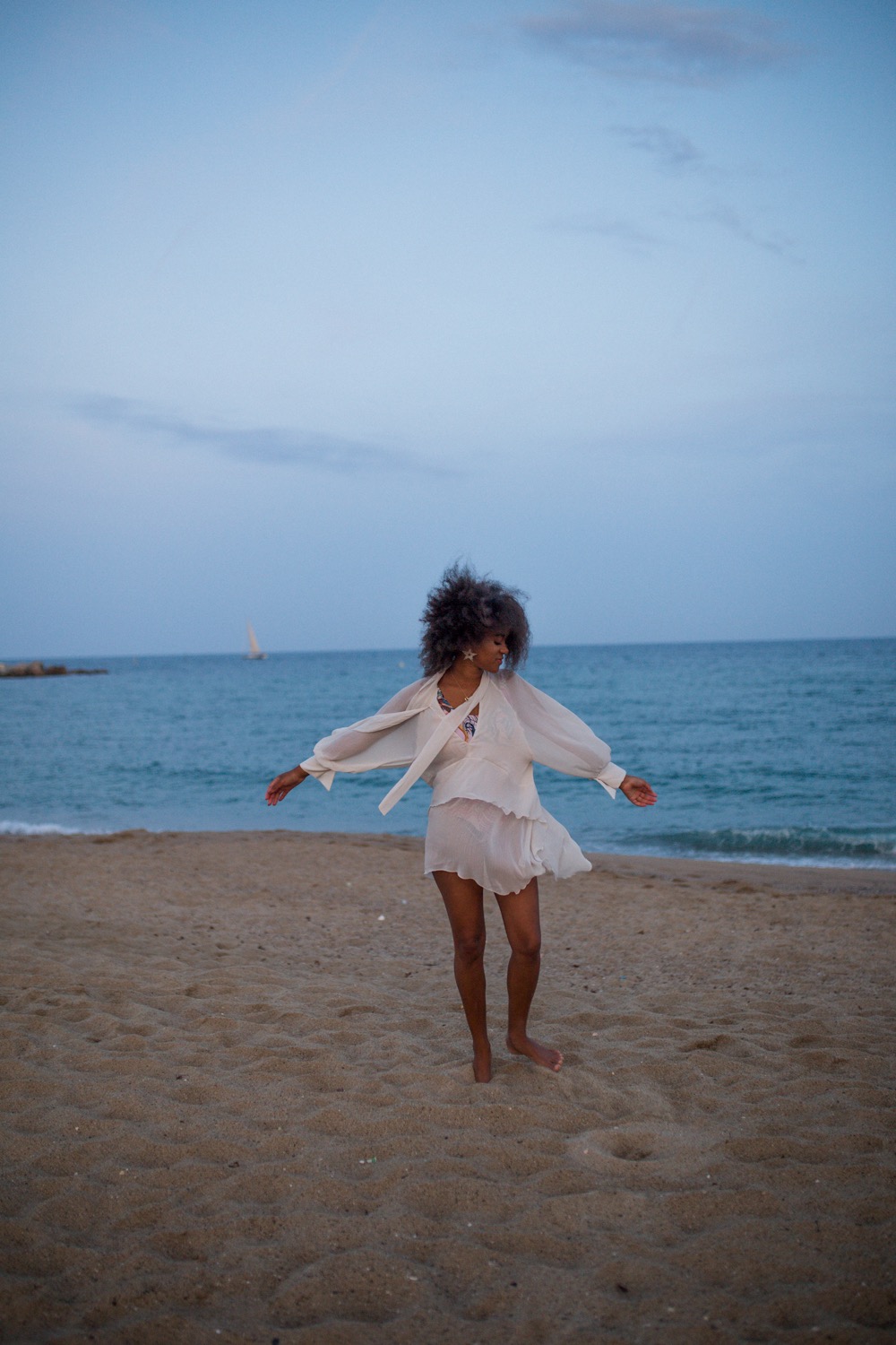 What to do in Barcelona in November FOMO Fear of missing out black girl at the beach