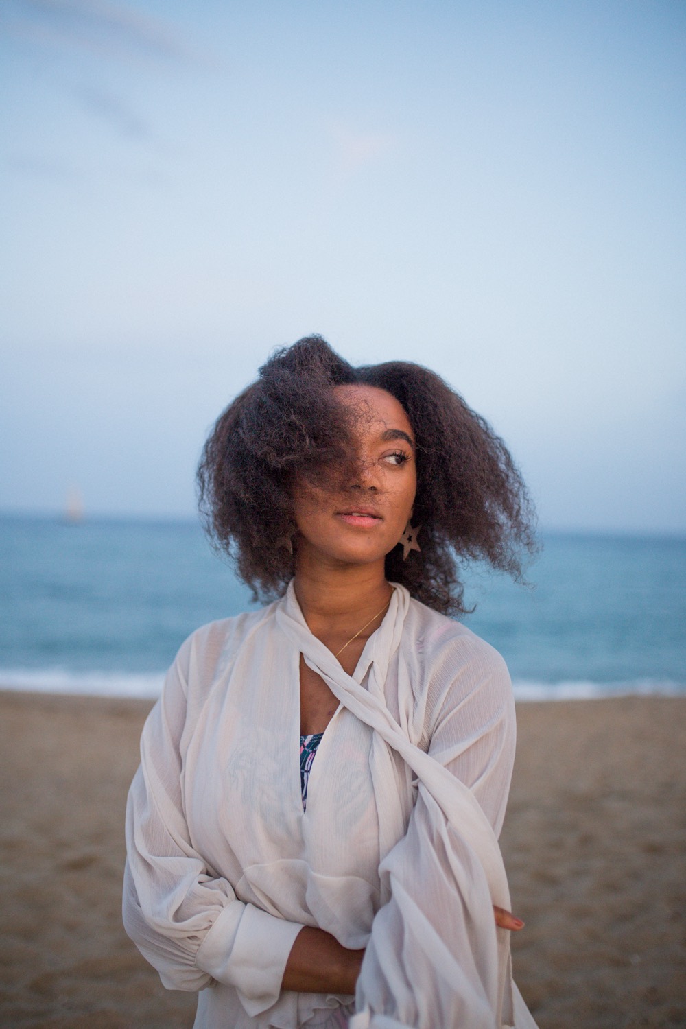 Afro Curls Natural Hair 4c hair Curly girl FOMO Fear of missing out black girl at the beach
