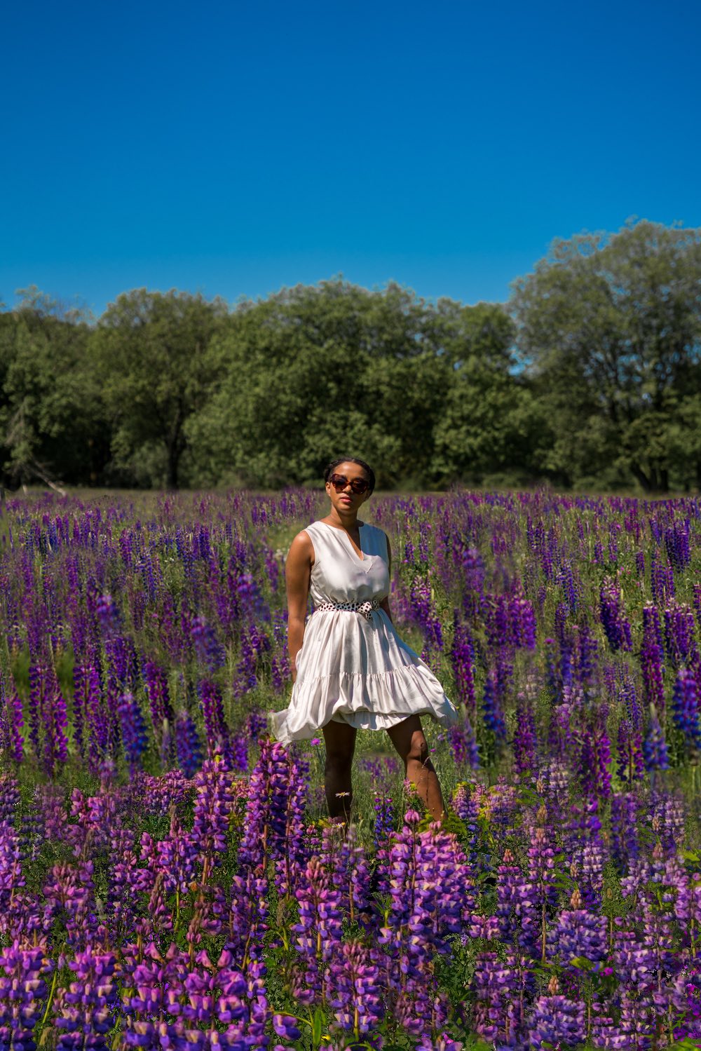 top german fashion blogger in a flower field