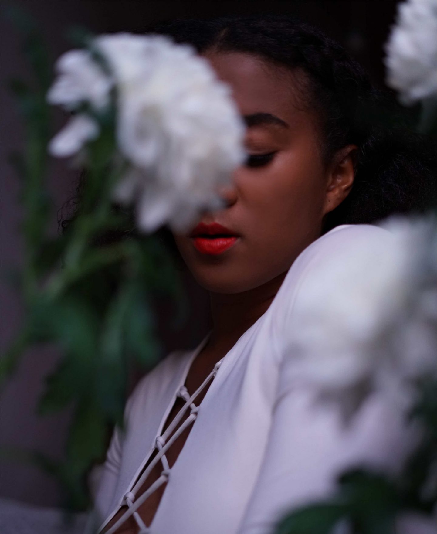 Black Fashion blogger wearing white body flower photography fashion beauty shooting