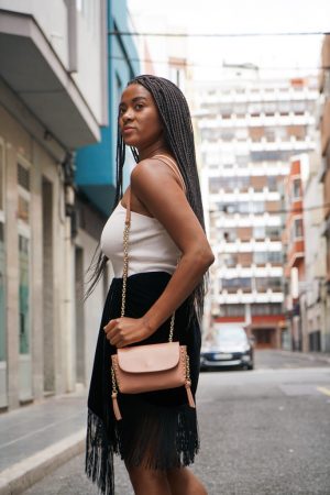 wearing fringes with crossbody bag