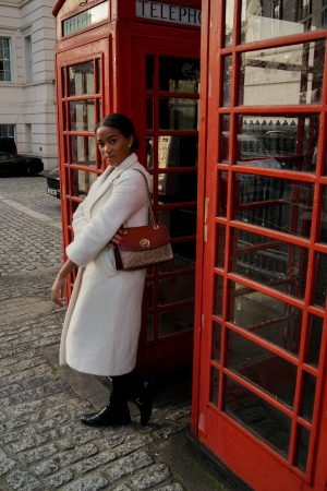 wearing a white coat in London