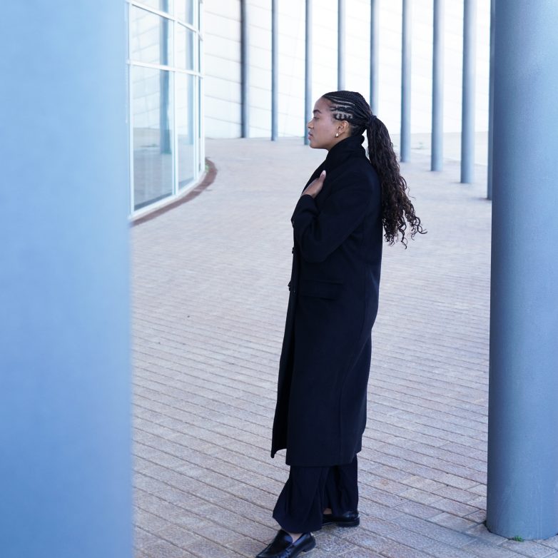 Wearing the black coat I wanted to buy years ago